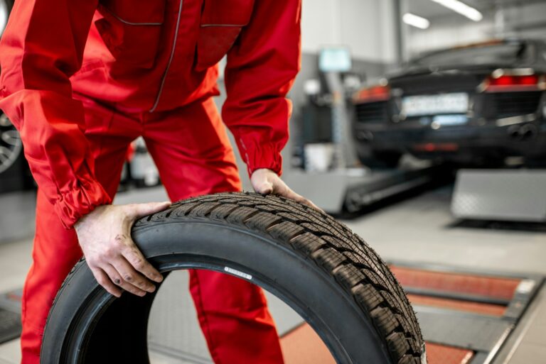 Carrying new tires at the service